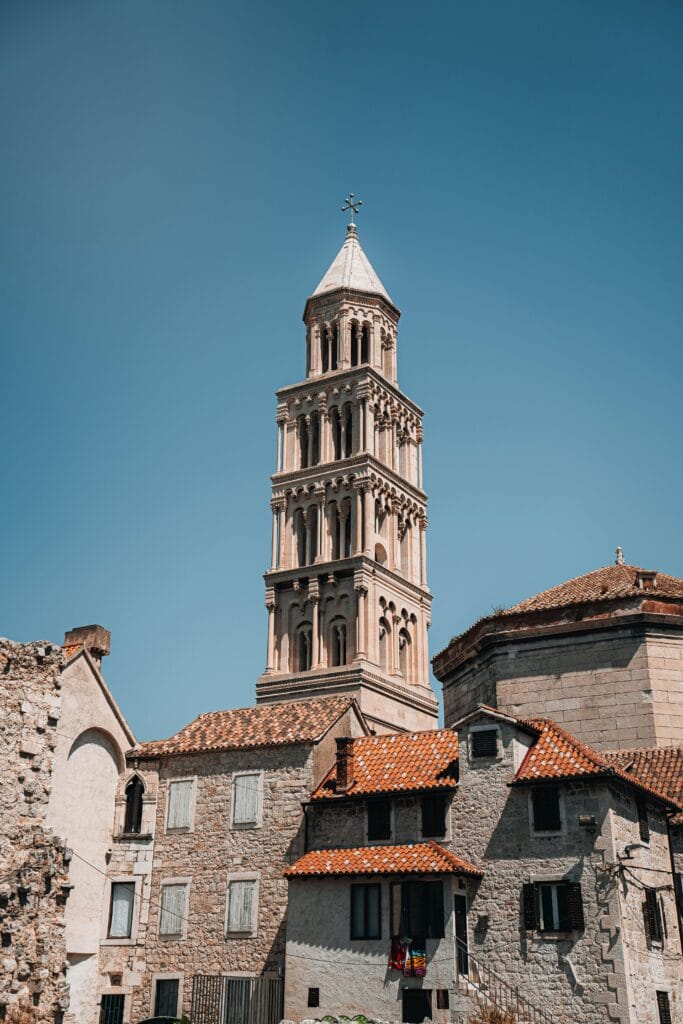 Vertical shot of Saint Domnius Cathedral in Split, Croatia with clear blue skies.